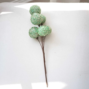 Glittery green Christmas decorative branch with five sparkling artificial berry spheres