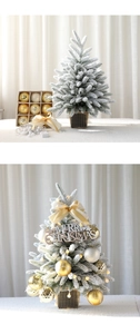 Mini Christmas tree with flocked snow, festive baubles and LED lights in golden pot
