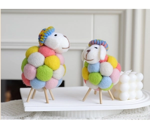 Detail of colorful wool felt sheep figurines with wooden legs in different sizes