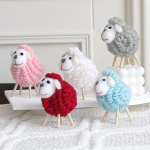 Set of five colorful handmade wool felt sheep ornaments for festive Christmas home decor