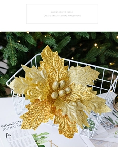 Close-up of golden glitter artificial poinsettia flower for Christmas tree decoration