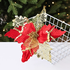 Golden red velvet poinsettia Christmas flower with gold glitter for tree decoration