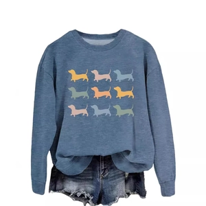 Blue crewneck sweatshirt with nine dachshund silhouettes print and denim shorts outfit