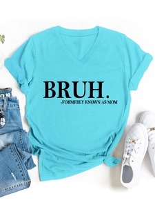Flat lay of blue V-neck slogan T-shirt with knotted hem and denim jeans set