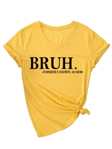 Detail of yellow V-neck tee featuring BRUH letter print and twisted knot hem design