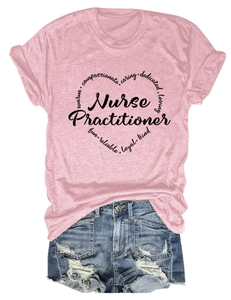 Flat lay of pink Nurse Practitioner t-shirt with heart graphic and distressed denim shorts