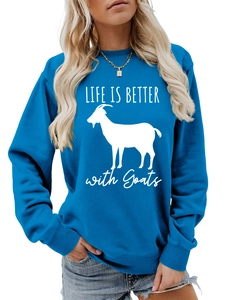 Detail of blue crewneck sweatshirt featuring white goat graphic and Life is Better text