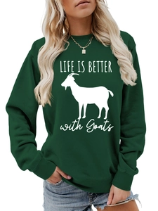 Detail of a dark green crewneck sweatshirt featuring white Life Is Better With Goats print