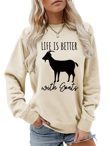 Detail of LIFE IS BETTER with Goats graphic print on a beige crewneck sweatshirt