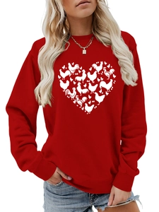 Detail of red crewneck sweatshirt with heart-shaped chicken silhouettes print