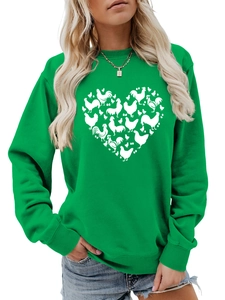 Detail of green crewneck sweatshirt with heart-shaped chicken silhouettes and ribbed cuffs