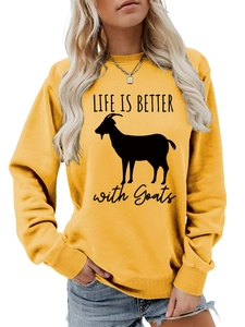 Detail of LIFE IS BETTER with Goats slogan and black goat print on yellow crewneck sweatshirt