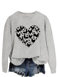 Detail of chicken heart graphic print on gray long sleeve crewneck sweatshirt