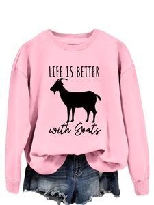 Pink crewneck sweatshirt detail with Life Is Better with Goats print and denim shorts
