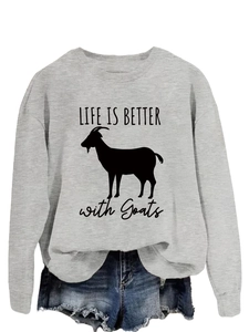Detail of grey crewneck sweatshirt featuring Life is Better with Goats slogan print