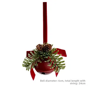 Detail of 6cm red Christmas bell with green pine needles, cones and a red velvet bow