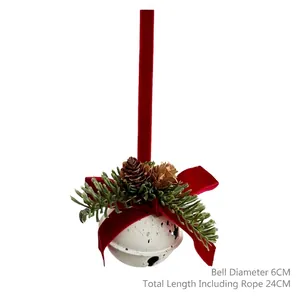 Christmas bell ornament with 6cm white metal bell, red velvet bow, and pine cones