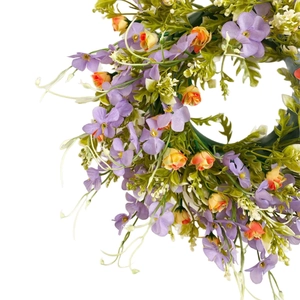 Artificial purple floral wreath with orange buds and green leaves for home wall decor