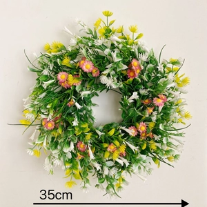 35cm Artificial Spring Wreath with yellow and pink flowers and green leaves on white background