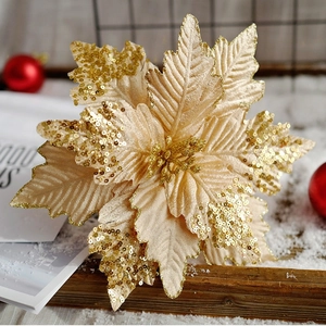 Grande stella di Natale in velluto champagne con paillettes dorate su vassoio in legno