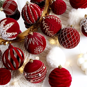 Luxurious dark red velvet Christmas ornaments with pearls and gold snowflake embroidery