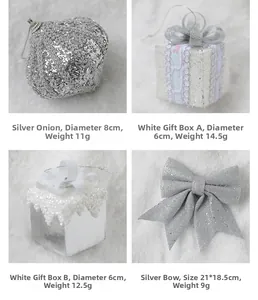 Detail view of silver glitter ornaments and white gift box pendants for Christmas trees