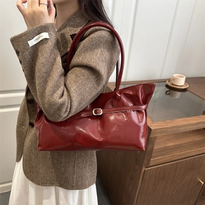 Retro wine red glossy PU leather tote bag with metallic buckle and shoulder straps