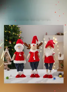 Detailed view of plush snowman reindeer and santa claus figures for christmas decor