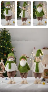 Detailed close-up of plush long-legged Christmas deer, snowman and Santa doll decorations