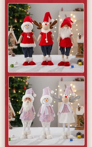 Close-up of Nordic faceless gnome plush dolls in festive red, blue, and purple sequin outfits