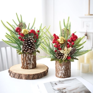 Two-piece Christmas miniature tree set with red berries and pine cones on wood base