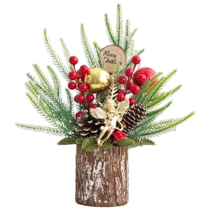 Mini Christmas tree in wooden base with red berries, pine cones and a golden angel