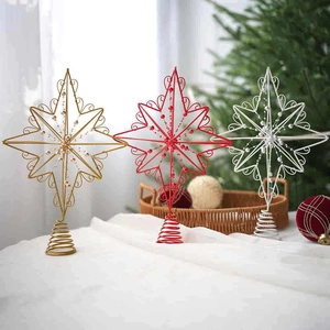 Three metal wire star Christmas tree toppers in gold, red, and silver with spiral bases