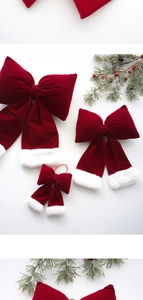 Three sizes of red velvet Christmas bows with white plush edges for tree decoration