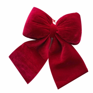 Deep red velvet Christmas bow decoration for trees and festive holiday gift wrapping