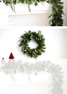 Detail of forest-style PE Christmas wreath and garland set with pine cones and needles