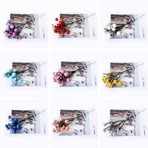 Detailed grid of colorful artificial berries branches for Christmas tree decor in nine shades