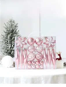 Pink Christmas ornaments set including glitter balls and snowflakes in a clear gift box