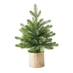 Realistic artificial green Christmas tree in a modern gold metal pot for desk decor