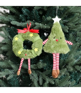 Detail of plush Christmas tree and wreath hanging ornaments with red striped limbs