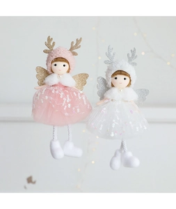 Detail of pink and white angel reindeer ornaments with sequin mesh skirts for Christmas