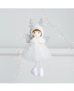 Close-up of white Christmas angel ornament with sequin mesh skirt and silver wings