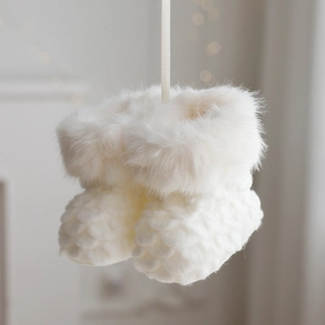 White plush Christmas boot ornaments with knit texture and fluffy faux fur trim