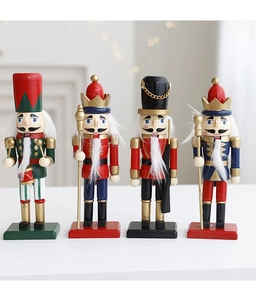 Detailed front view of four handcrafted wooden nutcracker soldiers in colorful uniforms