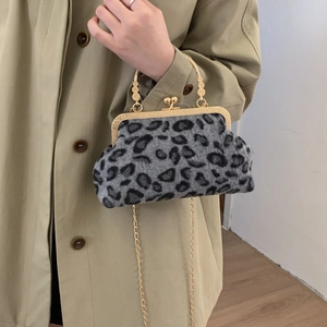 Fashionable leopard print crossbody bag with gold carved handle and chain strap for women