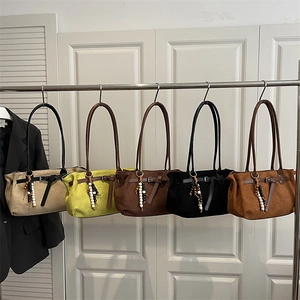 Minimalist matte faux suede tote bags in five colors with decorative wooden beads