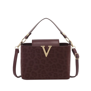 Burgundy leopard print handbag with golden V metal hardware and adjustable strap