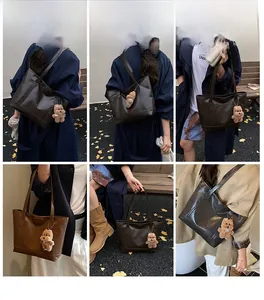 Detailed views of a large PU leather tote bag in coffee and khaki with a plush bear charm