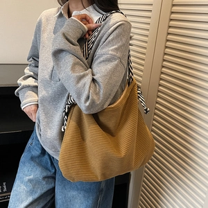 Yellow corduroy tote bag with large capacity and striped woven shoulder straps
