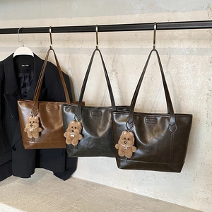 Retro faux leather tote bags in three colors with plush bear charms and fashion embossing